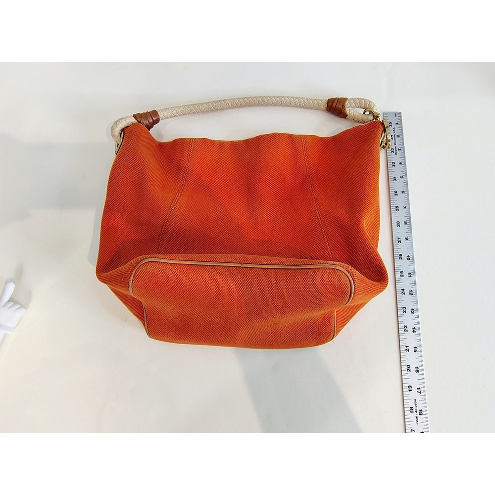Michael Kors Marina hobo bag features an orange canvas body with braided rope... - Picture 9 of 11